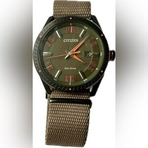 Citizen Eco-Drive Weekender Watch with Green Dial and Orange Accents